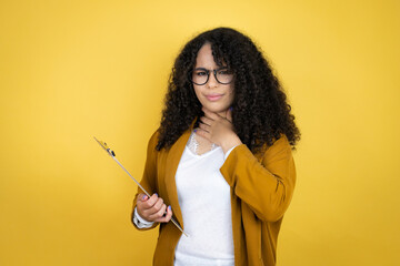 African american business woman with paperwork in hands over yellow background touching painful neck, sore throat for flu, clod and infection a plant isolated on yellow background
