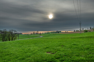 Cloudy dark evening near Roprachtice village with main road