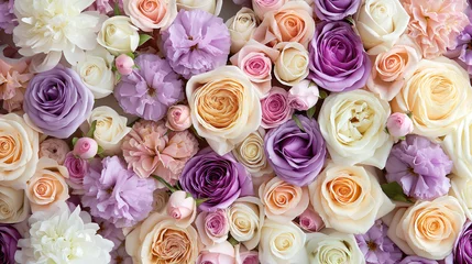 Foto op Canvas Flowers backdrop with purple white and cream roses, Flowers wall background for wedding decoration and presentation. © wittayayut