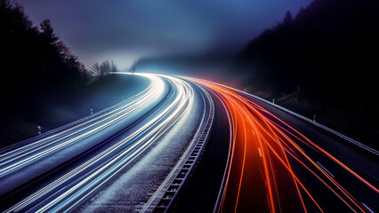 A long exposure shot of a highway at night with light trails from the traffic creating a vibrant display of movement and speed.