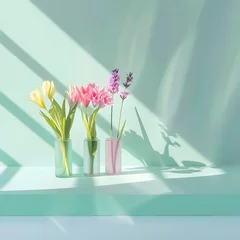 Foto op Canvas Fresh spring flowers in a vases on light background with shadows, minimal elegant concept. © Olivera