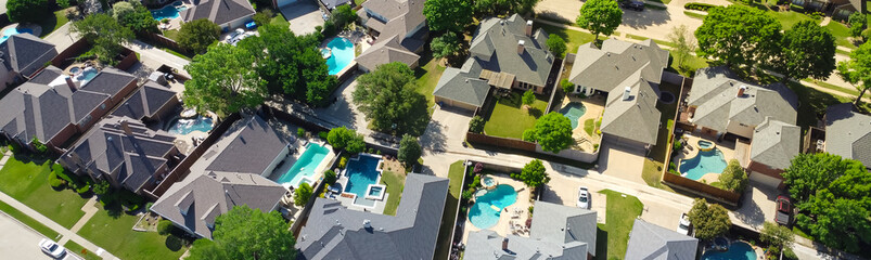 Panorama aerial view lush greenery suburban residential neighborhood subdivision, row upscale...
