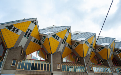Yellow-coloured cube houses in Rotterdam. Residential houses but also a tourist attraction.