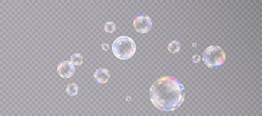 Realistic colorful soap bubbles with rainbow reflections and highlights. Vector illustration.