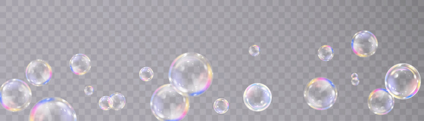 Realistic colorful soap bubbles with rainbow reflections and highlights. Vector illustration.