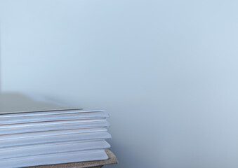 Stack of file folders against white background
