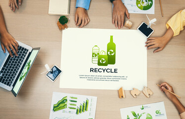 Recycle packaging placed on a meeting table during a green business meeting discussion. ESG...
