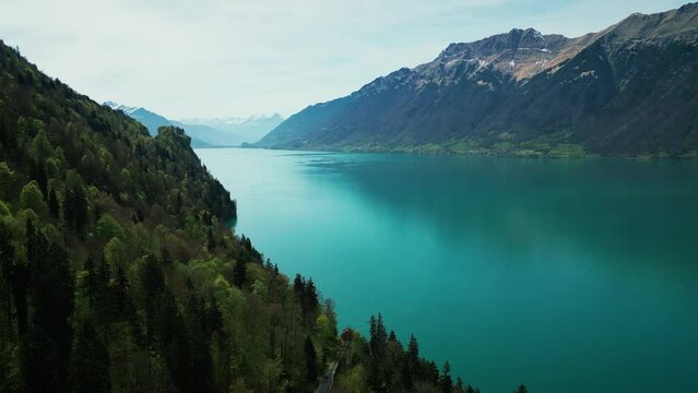 Giessbach lake with turquoise water. Picturesque lake with rocky mountains