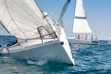 Close-up of sailing yachts racing in the mediterranean sea
