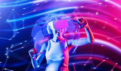 Female stand in cyberpunk neon light wear white VR headset and tank top connecting metaverse,...