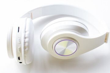 wireless white music headphones. For use in advertising or product catalog