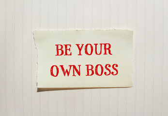 Be your own boss words written on ripped paper with notebook page background. Conceptual be your...