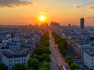Skyline of Paris with la Defense is a major business district and Avenue de la Grande Armee in Paris, France. Panoramic sunset view of Paris