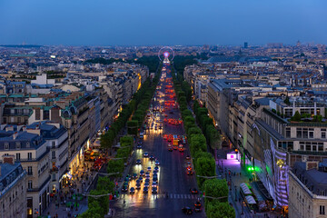 Aerial view of Avenue des Champs-Elysees in Paris, France. Night skyline of Paris. Architecture and landmarks of Paris