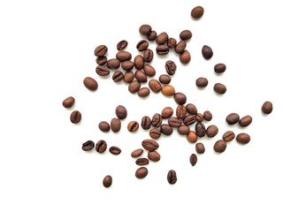 Aromatic pieces of coffee beans on a white background.