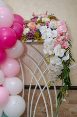 Decoration with balloons and flowers at a christening