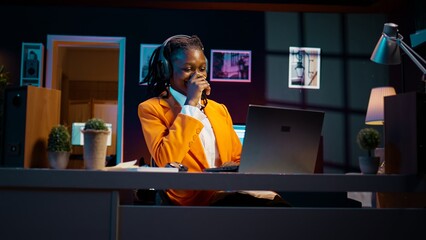 African american girl listening to professor debating latest lesson, taking notes after...