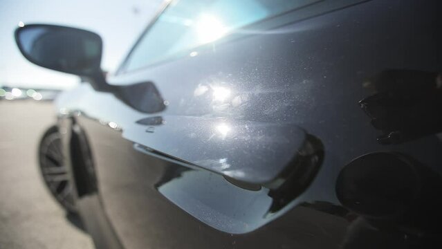 Close up view of the Porsche Taycan. Exterior of the luxury Porsche Taycan on a sunny day.