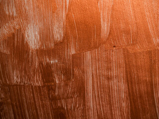 Obraz premium Brown color painted wall with brush paint strokes. Abstract texture background.