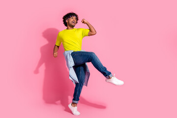 Photo of cheerful positive man wear trendy yellow clothes outfit look up empty space isolated on pink color background - obrazy, fototapety, plakaty