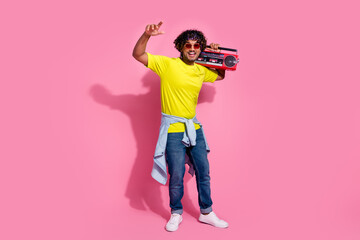 Fototapeta na wymiar Photo of funny positive man wear trendy yellow clothes outfit listen music sound melody isolated on pink color background