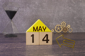 14 fourteenth day May Month Calendar Concept on Wooden Blocks. Close up.