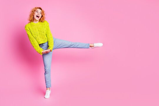 Full length photo of adorable lovely girl wear stylish outfit look empty space isolated on bright pink color background
