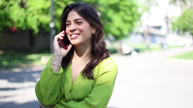Beautiful Latin woman talking on mobile phone