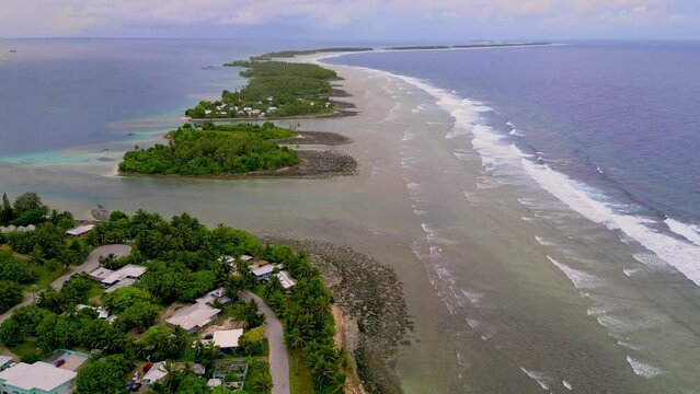 MARSHALL ISLANDS - 3.18.2024 - Fantastic aerial view of waves lapping the shores of outer islands in Majuro, the Marshall Islands.