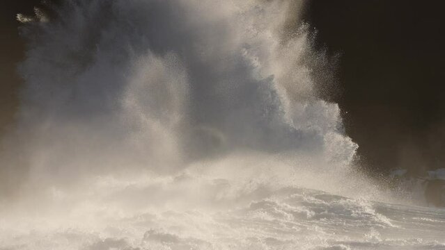HAWAII - 3.18.2024 - Amazing slow motion footage of a waves crashing upon a giant rock off the coast of Kaiaka in Molokai, Hawaii.