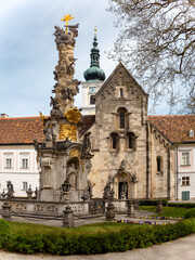 Heiligenkreuz, Austria - April 14, 2024: overall view on the details of exterior and interior of the Stift Heiligenkreuz abbey - 784839635
