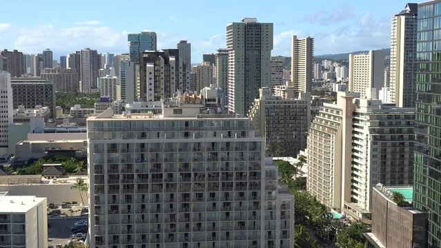 WAIKIKI - 3.19.2024 - Excellent aerial footage of tall residential buildings in Waikiki, Hawaii.