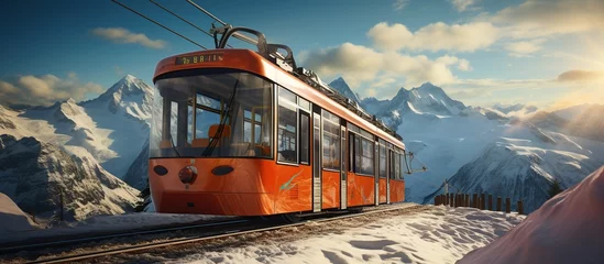 Foto op Canvas Tram on the background of snowy mountains. © WaniArt