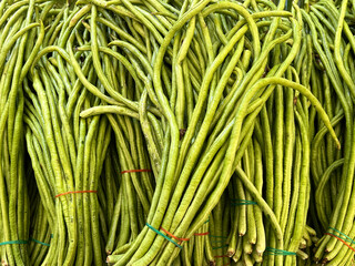 green yard long beans in a market