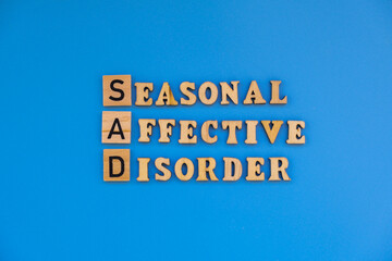 SAD seasonal affective disorder inscription message of mental health illness. Spiritual health problems difficulties pressure. Loneliness need vitamin C exhausted. Imbalance
