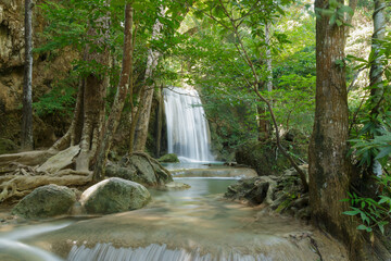 Beautiful Erawan waterfall with sunlight  in the morning , Kanchanaburi Province, Thailand.