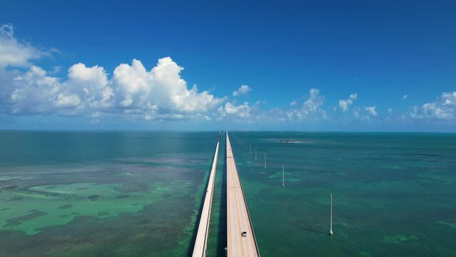 Aerial Epic Bridge Over Ocean. Seven Mile Bridge Florida Keys Drone Flight Cars Driving on Bridge Bright Daylight