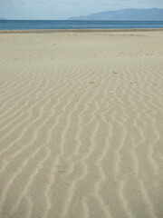 Fototapeta na wymiar 海に続く浜の模様