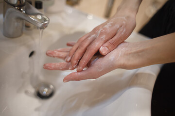 Hand washing with water, close-up