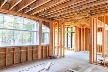 Inside frame wooden beams are utilized to support construction of new house