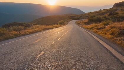 The Road Less Traveled: An Old Paved Road at Sunset in the Mountains