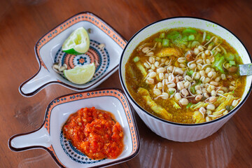 stew with vegetables and rice is called 'soto ayam' a cheap and delicious traditional Indonesian food