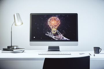 Creative light bulb hologram on modern laptop monitor, idea concept. 3D Rendering