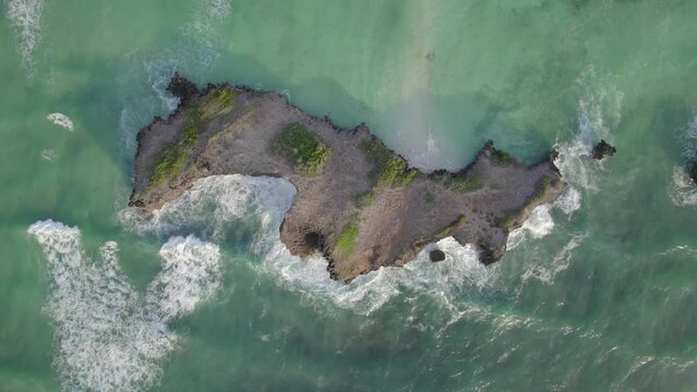 Aerial Bird's eye reveal drone shot of Island, Kenya coast