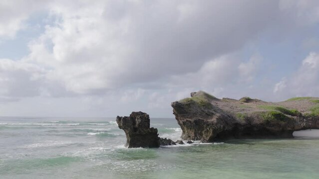 Low flying shot over Indian ocean Island in Watamu, Kenya