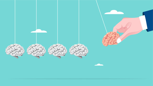 knowledge sharing to inspire the team, Coaching teams to achieve business success or achieve target, businessman hand pull smart human brain as pendulum to transfer knowledge to empty human brain