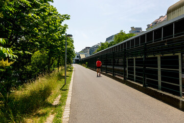 A running man near the Metro line  in Vienna