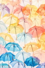 Obraz premium Array of Multicolored Umbrellas Opened Against a Bright Backdrop