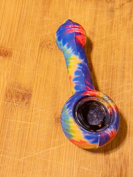 A tie-dyed silicone cannabis pipe
