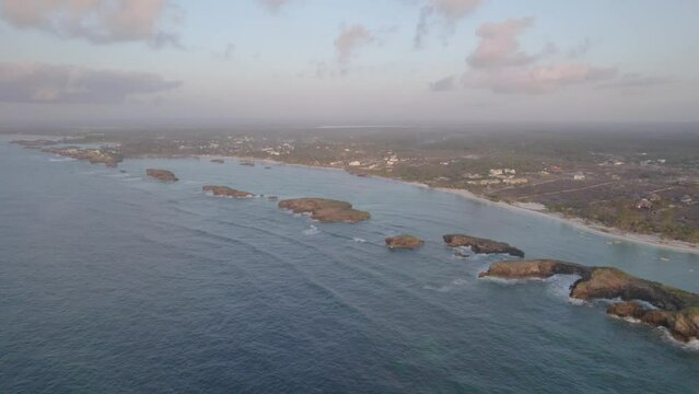 Wide shot of morning light on Islands, of the coast of Kenya
